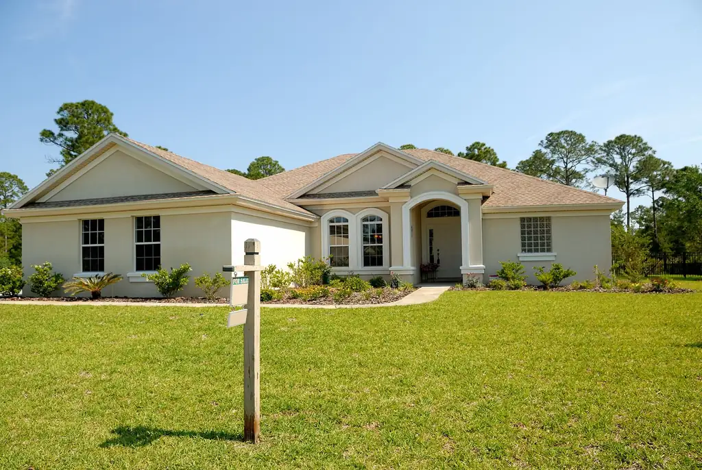 Single-family home exterior with full roof plane visible — roofing and exteriors